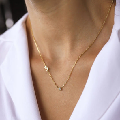 Sideways pavé letter necklace, alphabet variation D