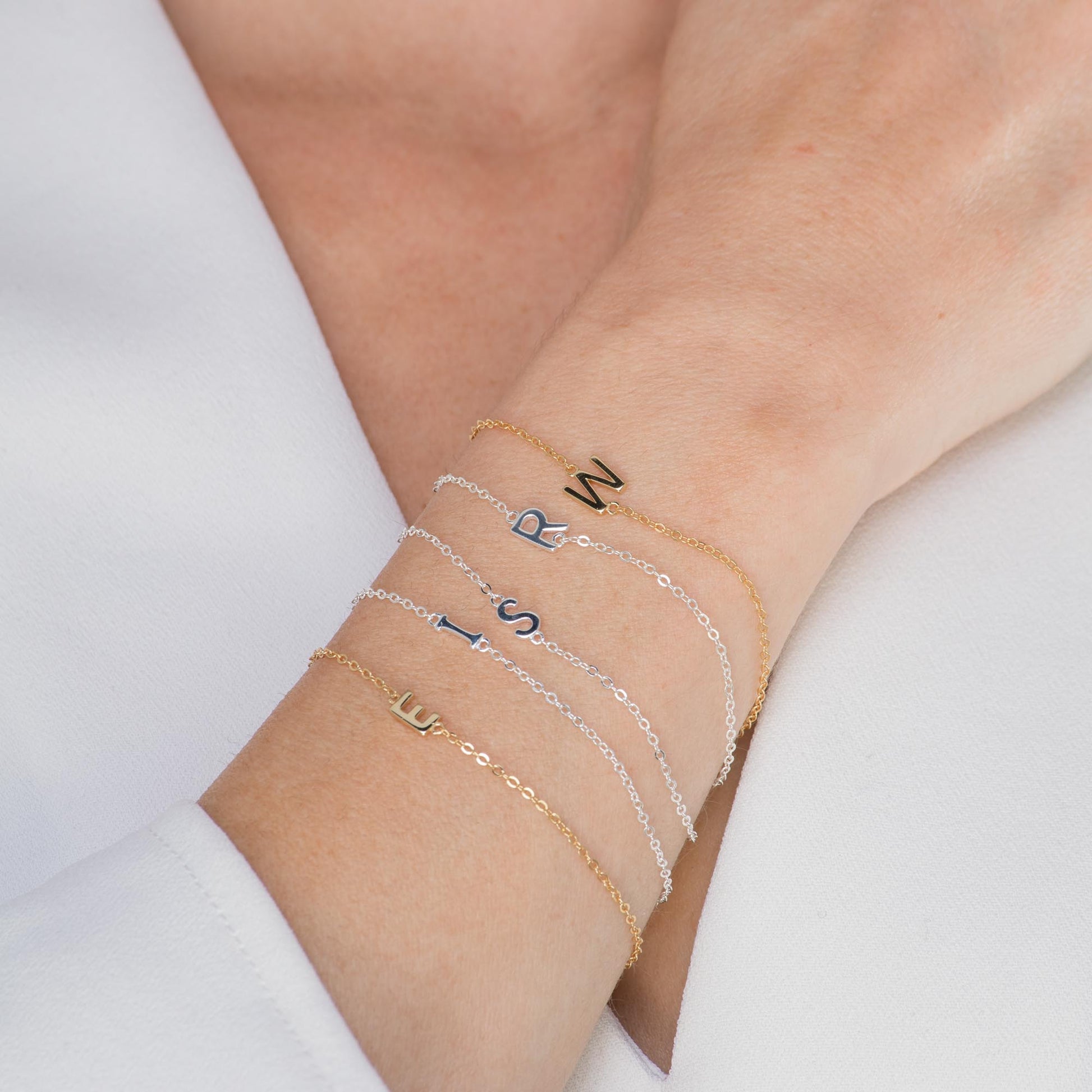 Sideways initial bracelet variation A in gold vermeil