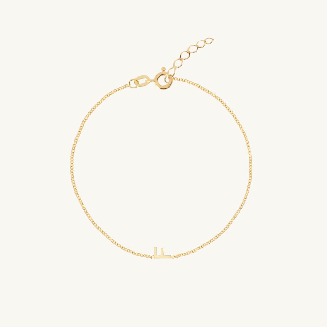 Sideways single initial letter bracelet in gold vermeil