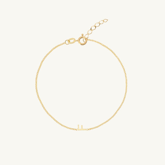 Sideways single initial letter bracelet in gold vermeil
