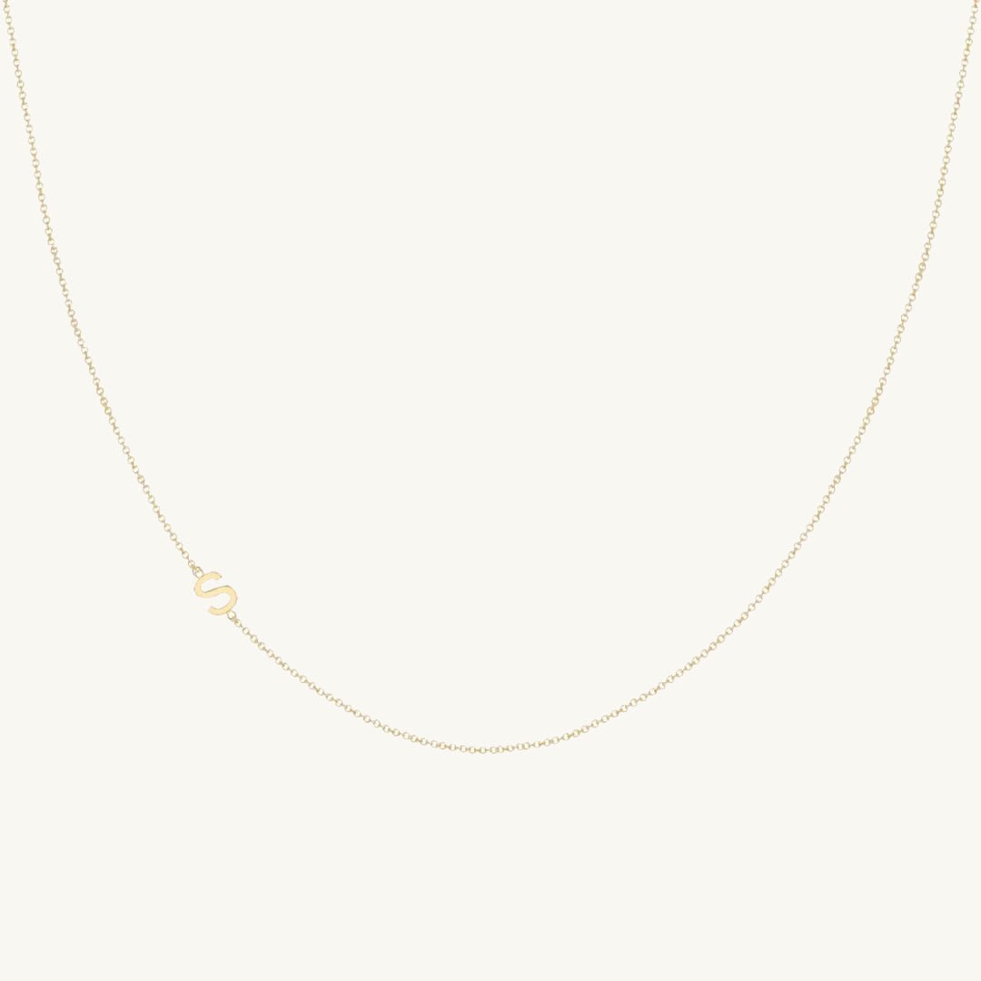 Sideways single initial letter necklace in 18K gold vermeil