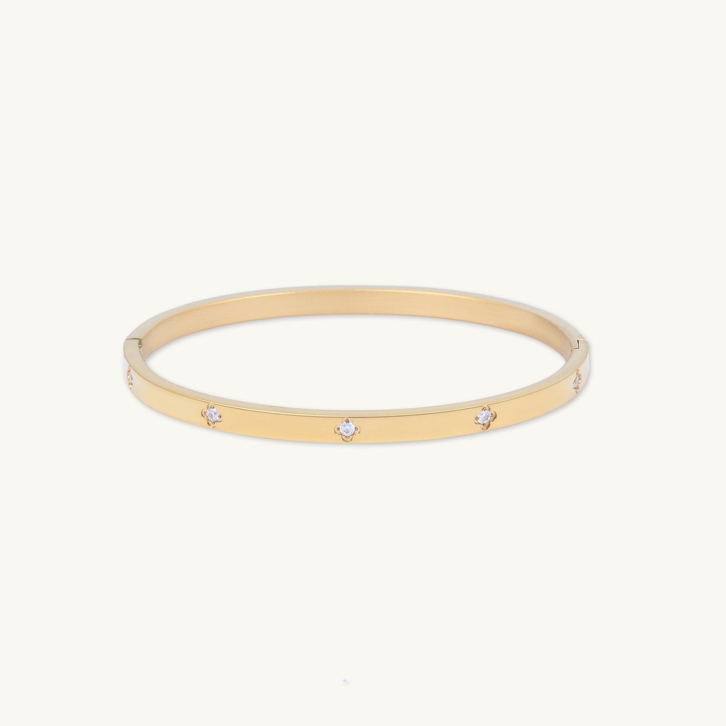 Slim clover zirconia hinged bangle bracelet in gold