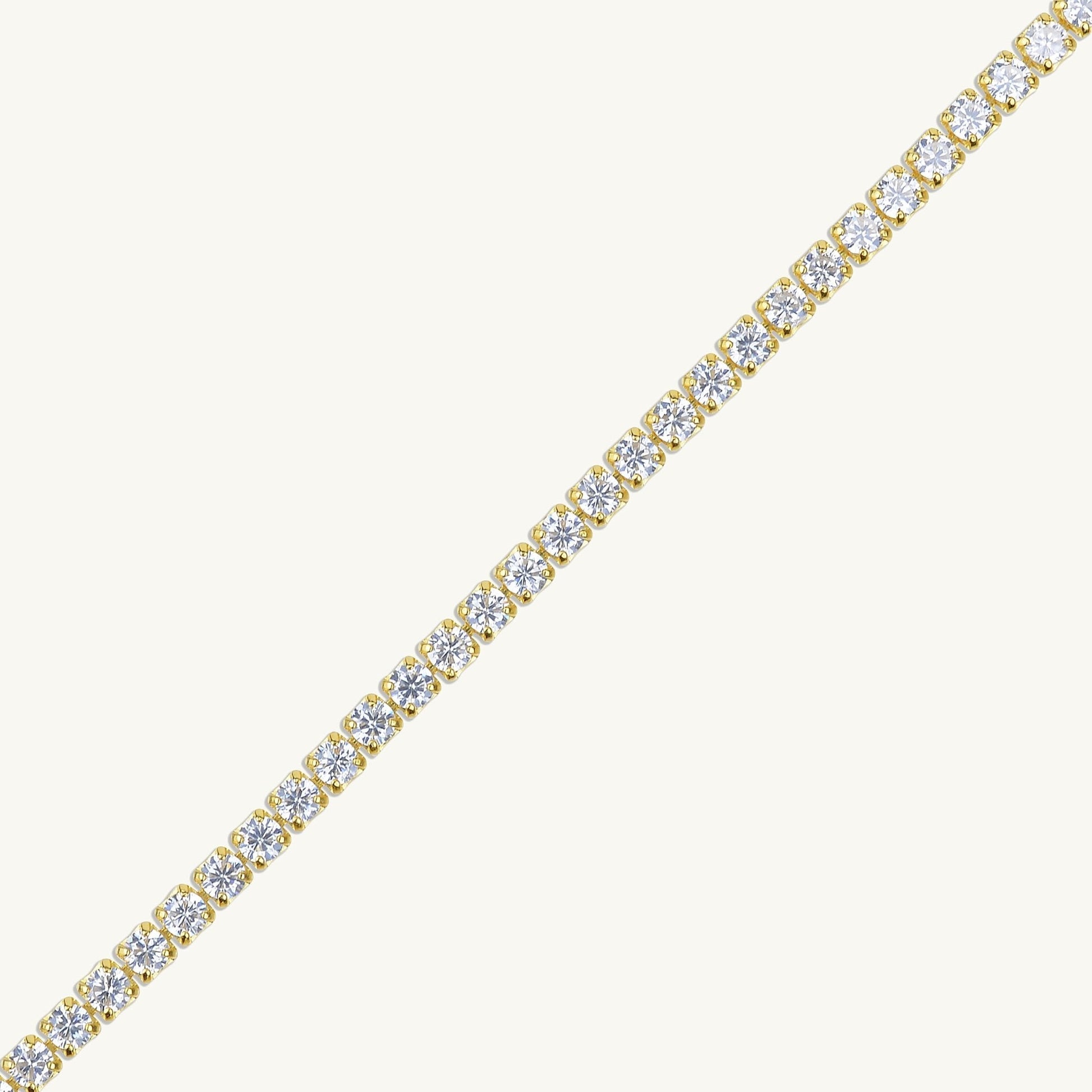 Tennis bracelet with secure clasp, sapphire detail
