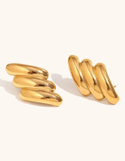 Wing Theory earrings – flat lay presentation