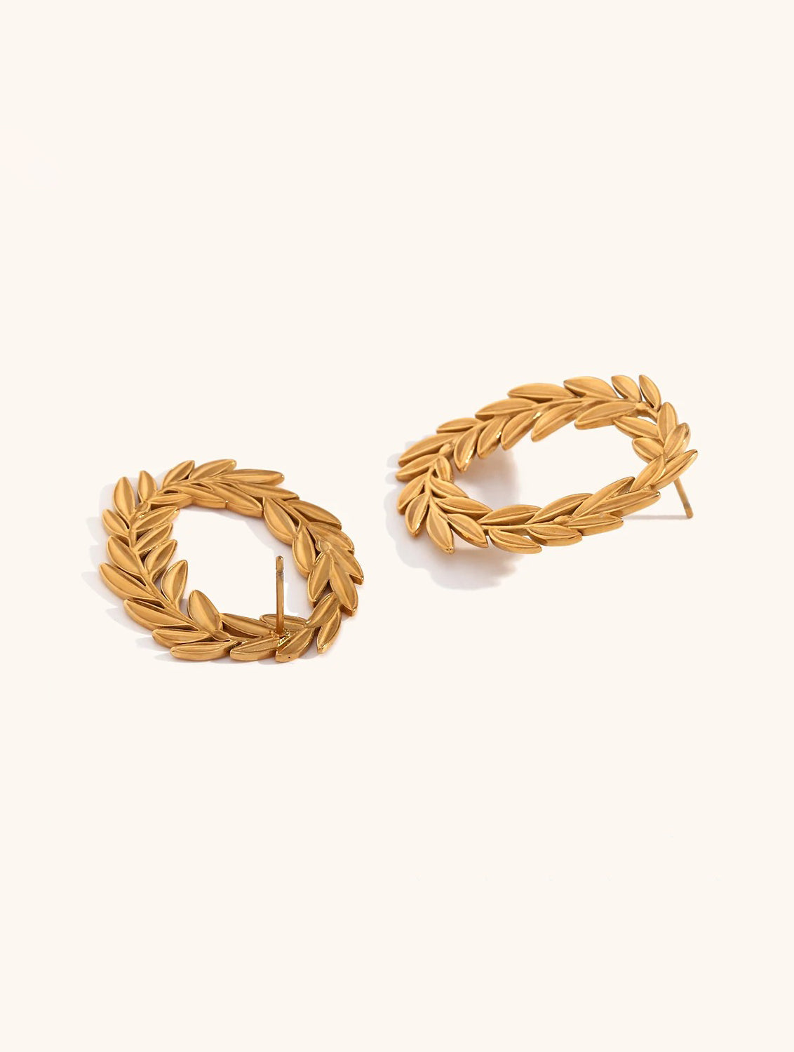 Laureled Empress gold hoop earrings with laurel leaf detail by Ravyena