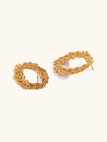Laureled Empress gold hoop earrings with laurel leaf detail by Ravyena