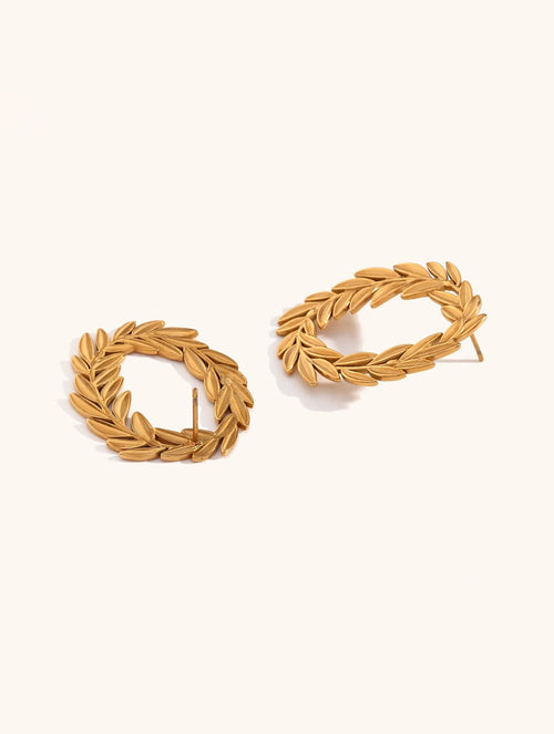 Laureled Empress gold hoop earrings with laurel leaf detail by Ravyena